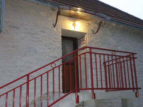 Stairs leading to apartment or business